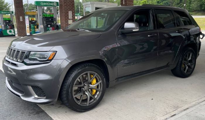 Jeep Grand Cherokee Trackhawk at a fuel station